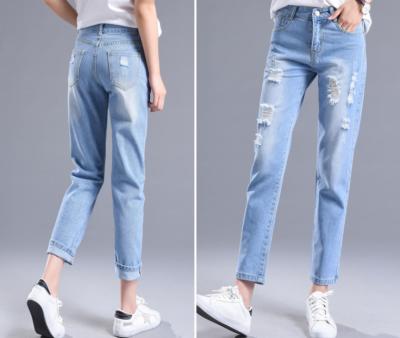 фото 1 Рваные джинсы с высокой талией