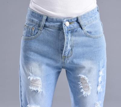 фото 3 Рваные джинсы с высокой талией